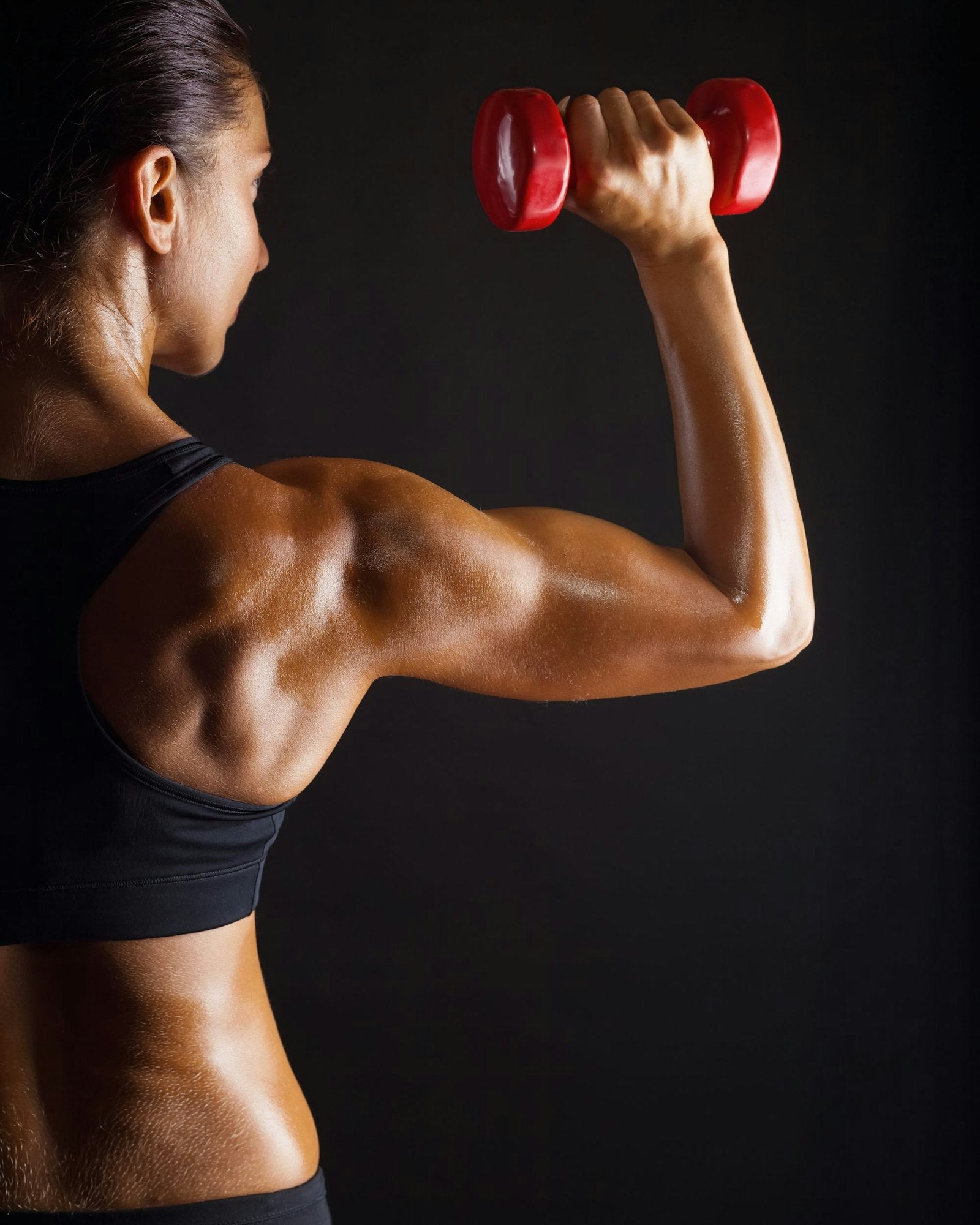 Athlete receiving post-workout muscle recovery massage